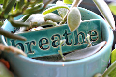 Image of ceramic dish inscribed Breathe